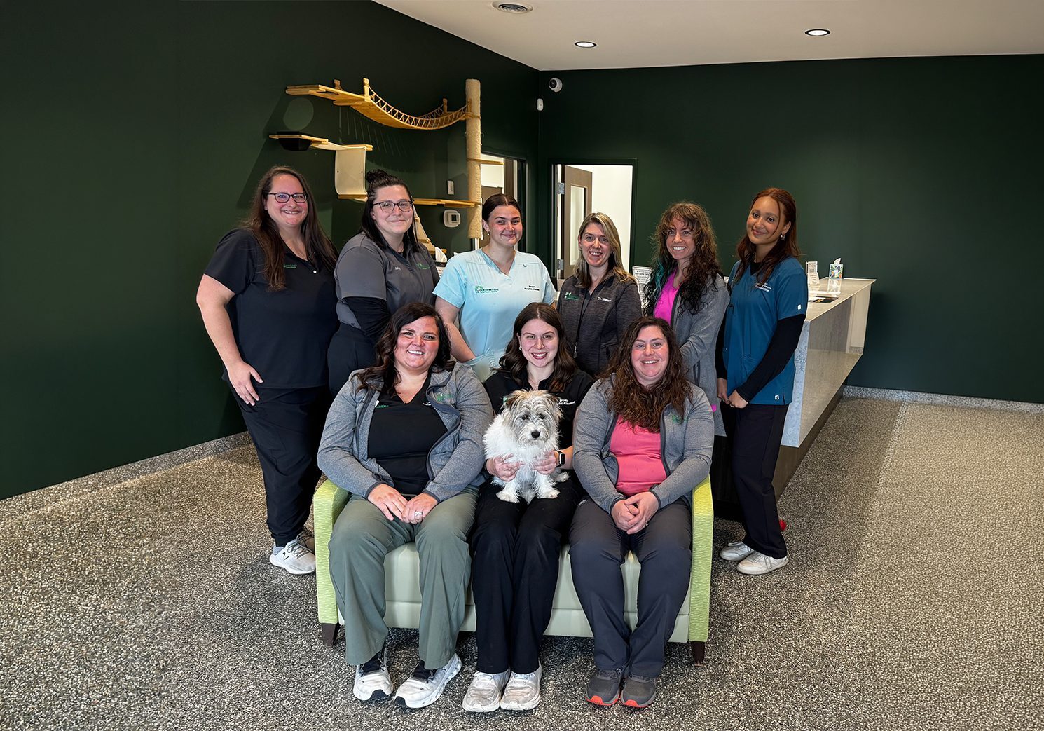 All Staff Members Posing For Group Photo